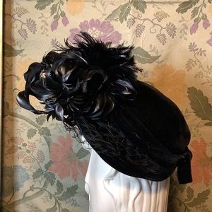 Vintage black velvet hat with feather embellishment from John Wanamaker